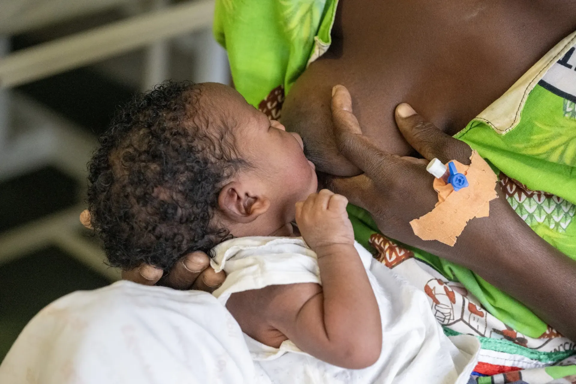 Eugenia Casttillo, a 31-year-old mother of three, breastfeeds her newborn Noemi at Sampaka Hospital in Malabo, the capital of Equatorial Guinea.